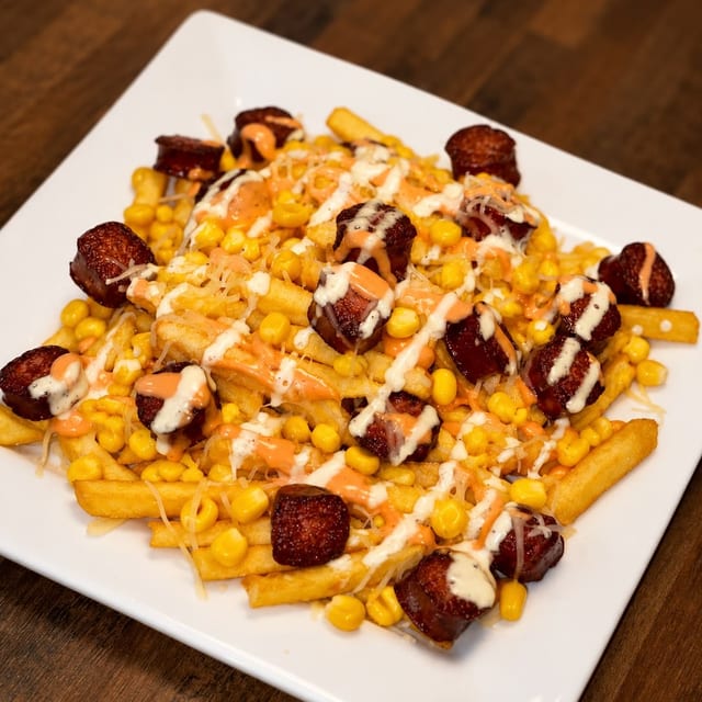 Sausage with French Fries / Salchipapas.